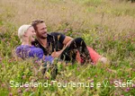 Pause in einer Blumenwiese